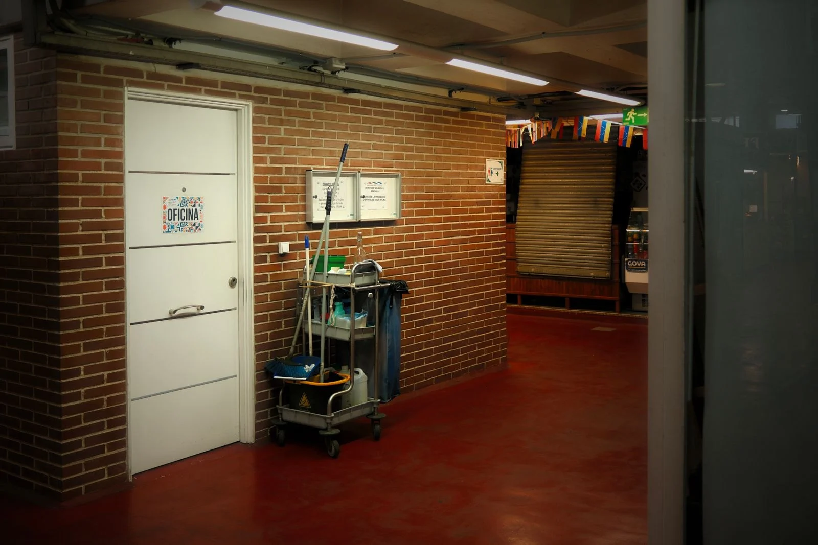Cleaning cart in a commercial hallway