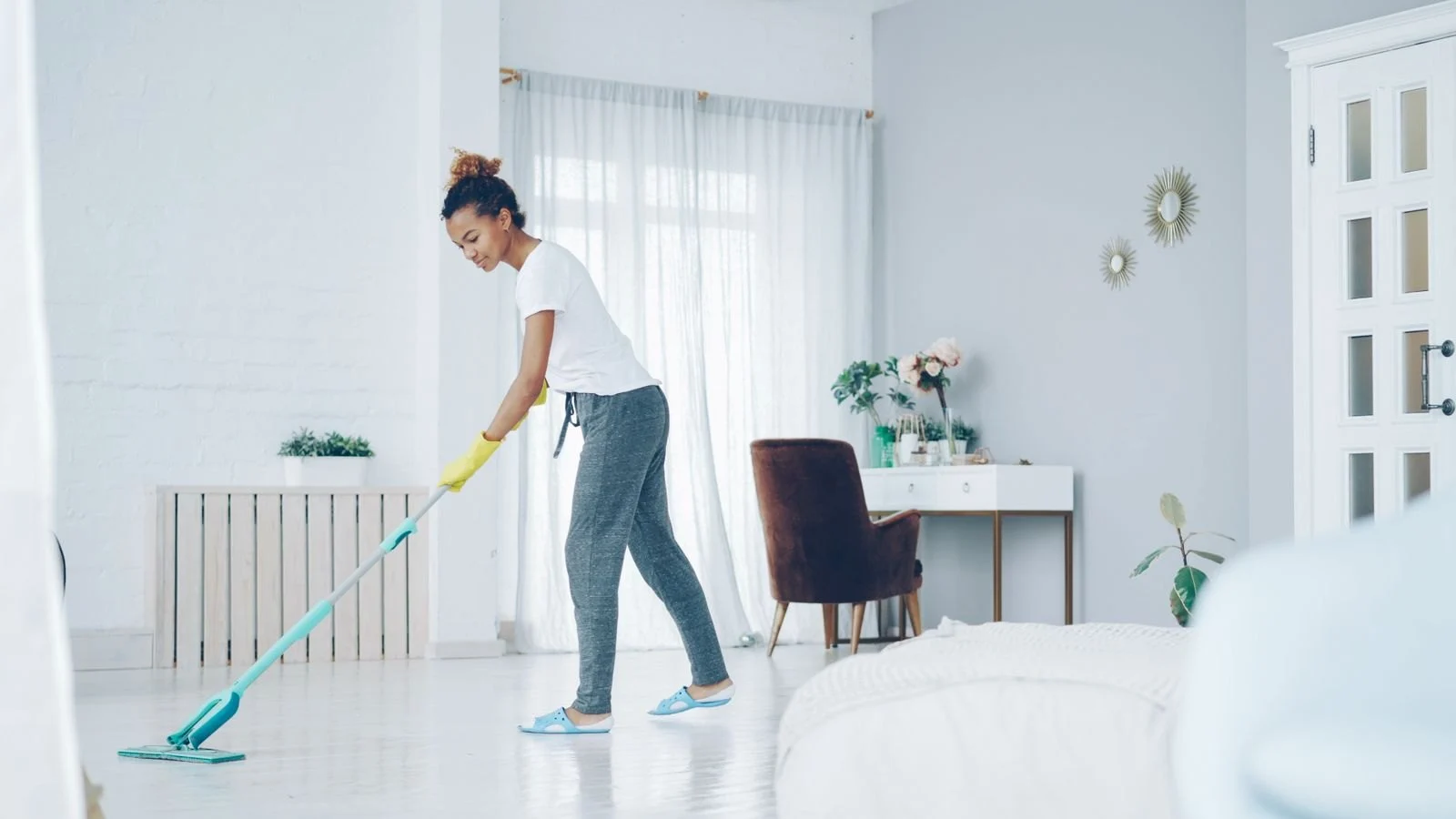 Mopping a bright living space