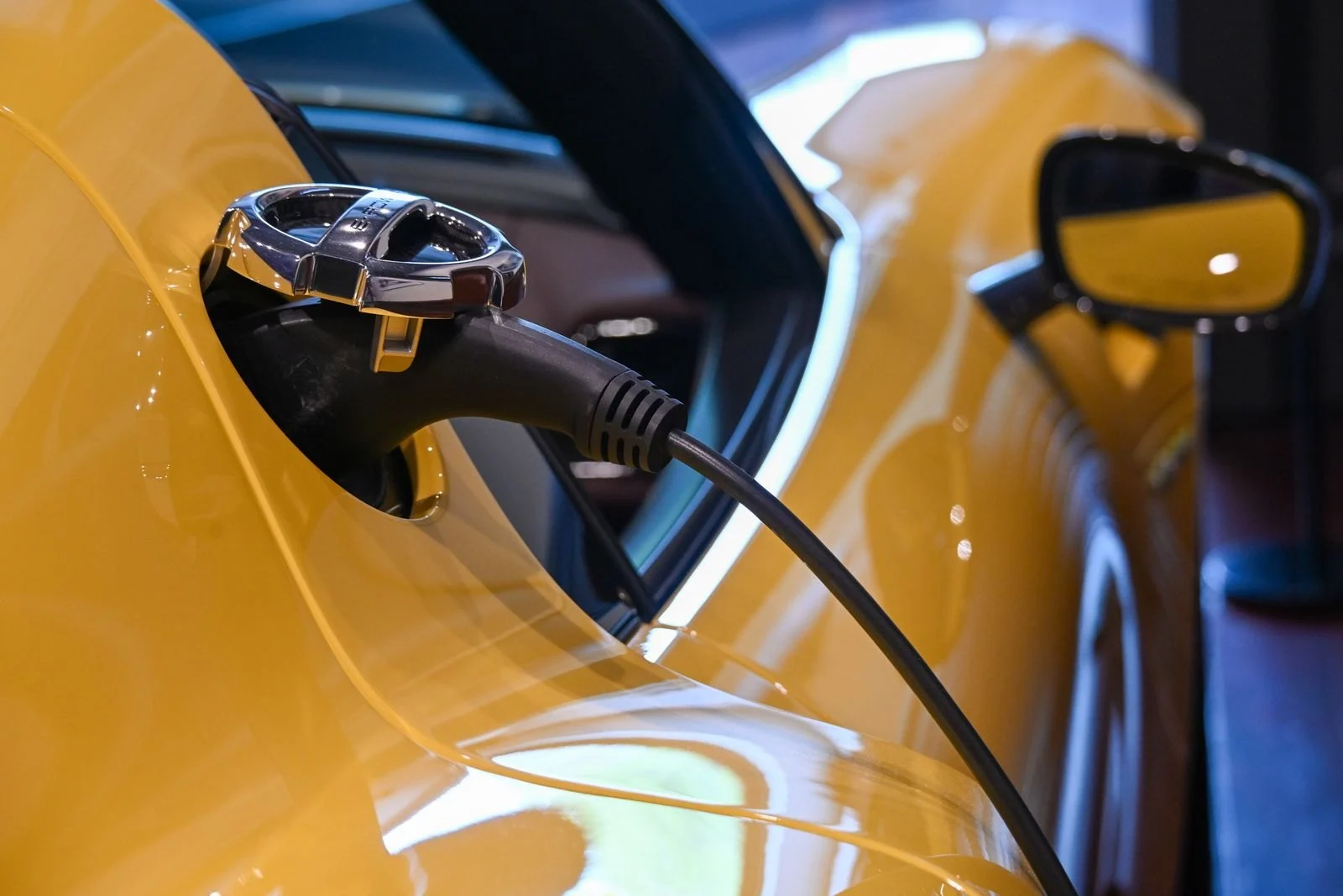 Electric vehicle connected to a charging cable