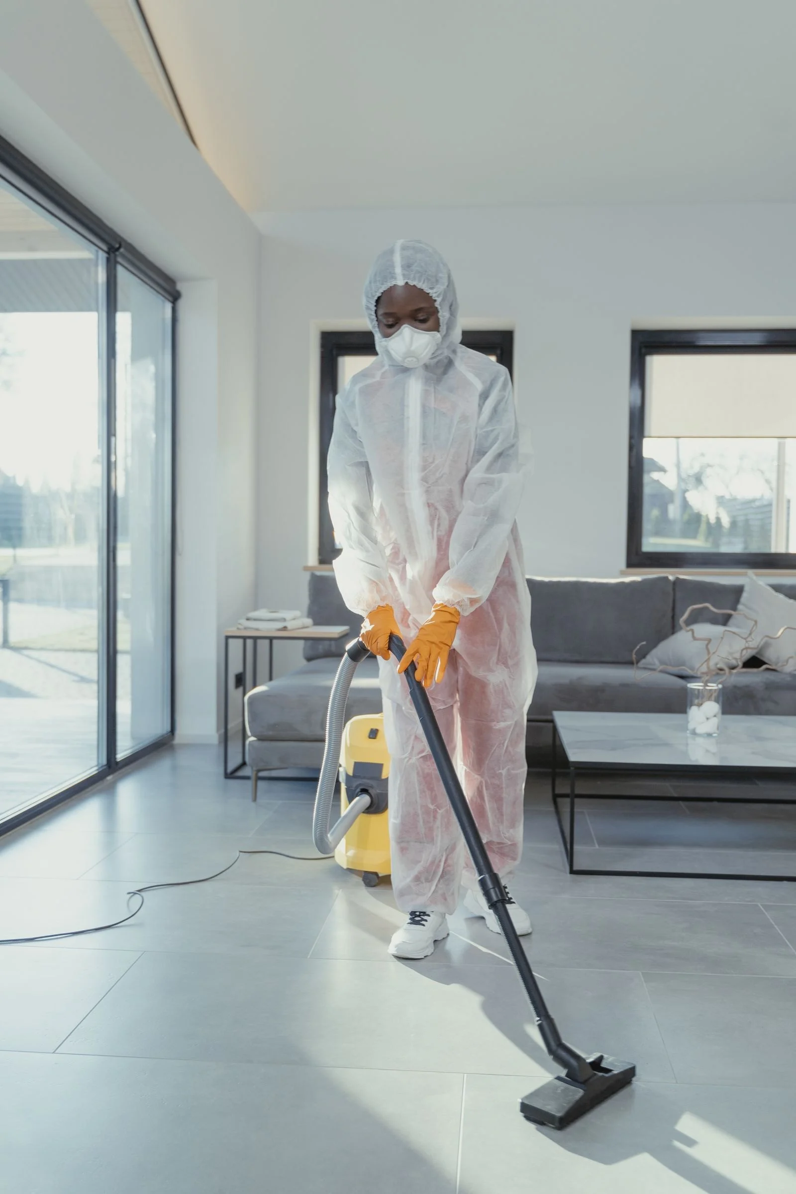 Vacuum cleaning with protective clothing