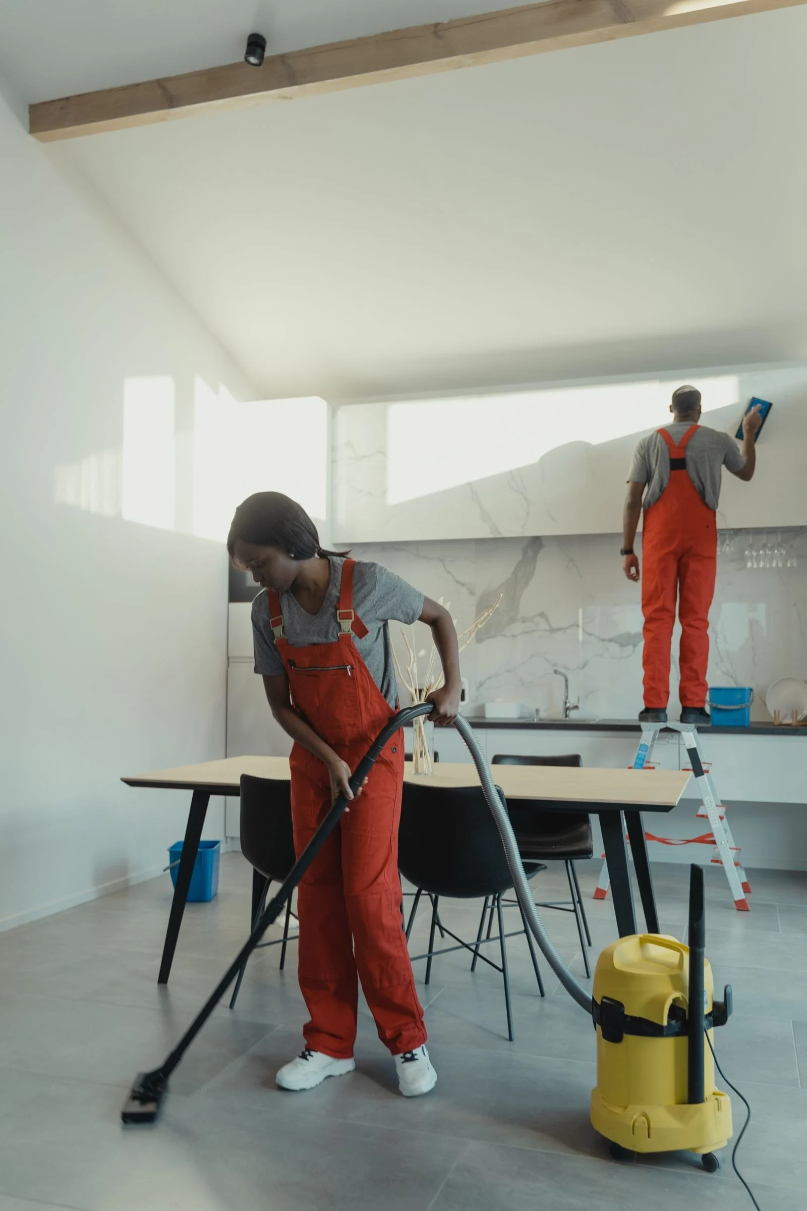 Team working through an interior clean