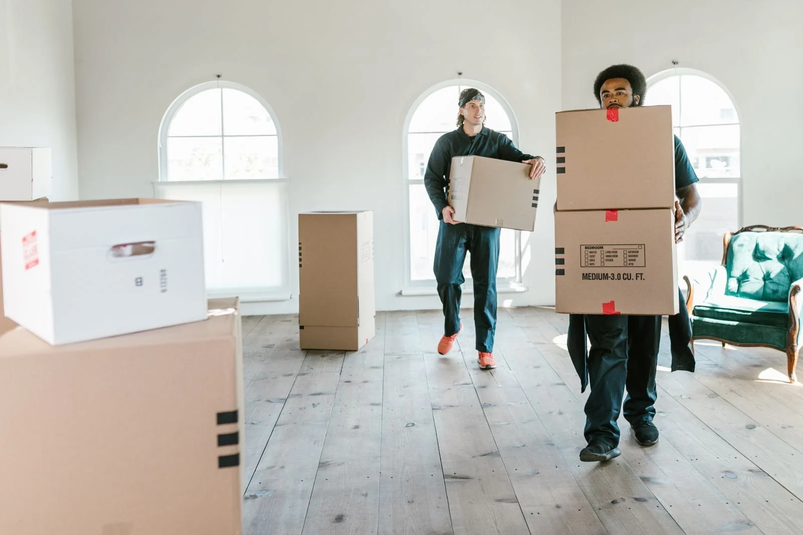 Carrying boxes during a property clearout